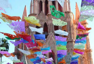 San Miguel de Allende's Parroquia and plaza decorated with cut paper banners © Sylvia Brenner, 2010, 2012