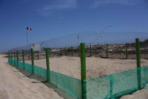 Turtle pens are usually closed off with chain link fences or other materials to keep predators from gaining access to the eggs. This sea turtle conservation project is located in Todos Santos, Baja California Sur. © Mariah Baumgartle, 2012