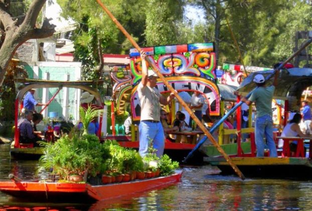 At Xochimilco, Mexico, pots of flowers and plants are sold by gardeners who live along the waterways © Edythe Anstey Hanen, 2013