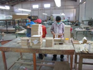 Crafting high end wood boxes for hand-rolled Puros Santa Clara cigars in Mexico. © William B. Kaliher, 2012