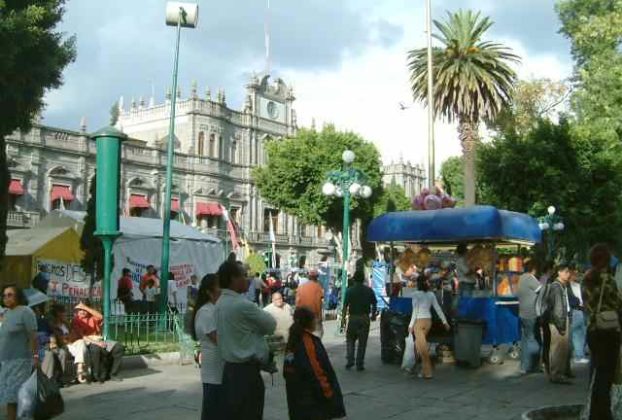 The impressive Palacio del Ayunamiento (city hall) anchors and occupies most the block north of the zocalo. There is a hotel and McDonalds on the west end of the block.