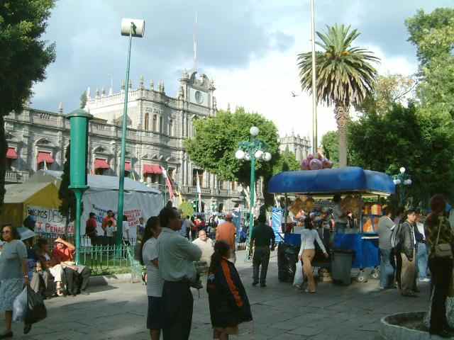 The impressive Palacio del Ayunamiento (city hall) anchors and occupies most the block north of the zocalo. There is a hotel and McDonalds on the west end of the block.