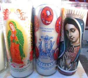 Candles are among the many Guadalupe themed items for sale outside the cathedral in Oaxaca on December 12 © Tara Lowry, 2014