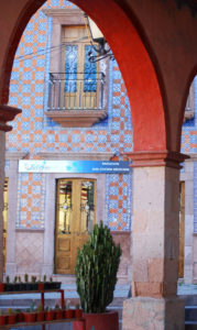 Moorish or Mudejar influence is evident in the decorative ceramic tiles that cover the façade of Casa Tsaya. Located on Avenida Zaragoza in Bernal, Querétaro, the hotel boasts a a charming courtyard restaurant. © Jane Ammeson 2009