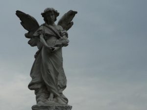 A sculpture of an angel watches over the long-interred victims of the Dos Estrellas mudslide. Mexico's 19th century Dos Estrellas mine is located within the municipality of Tlalpujahua de Rayon in southern Michoacan © Anthony Wright, 2009