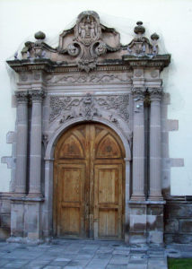 Elaborately carved quarry stone brings elegance to the secondary entrance of the San Augustin Church in the Mexican city of Durango. Construction of the church began in the beginning of the 17th century. Remodeling and additions were still in process during the 19th century. © Jeffrey R. Bacon, 2009
