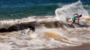 Skill, grace and athleticism combine in a spectacular ride. Melaque is a popular Mexico beach with the skimboard crowd. © Gerry Soroka, 2010