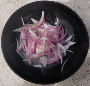 Crescents of red onion ae marinated in lemon juice with a pinch of oregano. Another option is to add orange juice and habanero chile to create an ixnipic sauce, typical of Southern Mexico. Either one is a great garnish for tortas ahogadas de camaron — shrimp sandwiches drenched in a chipotle cream sauce. © Daniel Wheeler, 2010