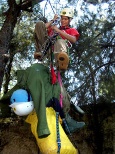 Entering and exiting deep caves while suspended from a single rope requires special gear and much practice. Here Mexico's Rocio Garcia tests techniques for rescuing an unconscious climber. © John Pint, 2010