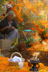 Burning herbs and candles create a relaxing, serene environment in Santa Fe de la Laguna's panteón.