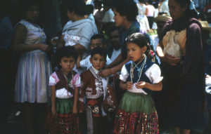 Children wear clothing from the late 19th and early 20th centuries in this photograph, which dates from the 1960s. They take part in the religious processions and pageantry of Good Friday celebrations in San Miguel de Allende, Mexico. Hardly changed, the tradition continues to this day. © Don Fyfe Wilson, 1964, 2010