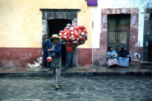 Townspeople await the pageantry and processions of Good Friday in San Miguel de Allende, Mexico. This photograph dates from the 1960s. © Don Fyfe Wilson, 1964, 2010