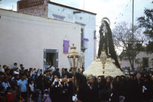 The Virgin Mary as Our Lady of Sorrows is carried through the streets of San Miguel de Allende in the Good Friday procession. This 400-year-old town celebrates Holy Week each year with some of the most powerful and beautiful pageantry in Mexico. © Don Fyfe Wilson, 1964, 2010