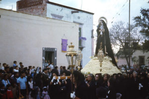 The Virgin Mary as Our Lady of Sorrows is carried through the streets of San Miguel de Allende in the Good Friday procession. This 400-year-old town celebrates Holy Week each year with some of the most powerful and beautiful pageantry in Mexico. © Don Fyfe Wilson, 1964, 2010