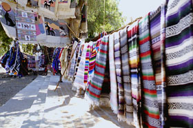 Sarapes displayed on a clothesline © Susanne Zimmerman, 1997