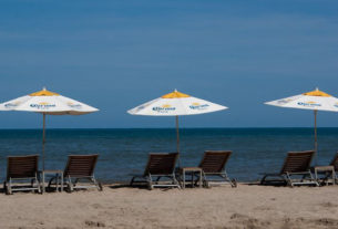 Beach chairs along the shore invite the visitor to relax a while in Sayulita, Mexico © Christina Stobbs, 2012