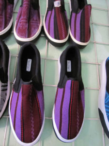 Shoes for sale at the Tixinda cooperative in Pinotepa de Don Luis, Mexico, feature handloomed fabric. © Geri Anderson, 2011