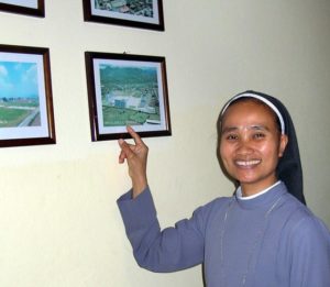 Sister Nenita, chief administrator of Mexico's Villa de los Niños, talks about one of the first Boys Towns founded by her organization in her home country, the Philippines. © John Pint, 2012