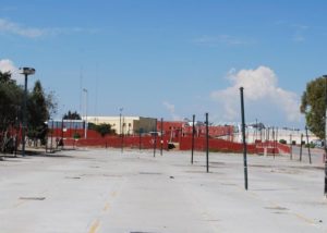 Like a shimmering mirage that lasts only until your next blink, the Tuesday Market, or 'tianguis,' appears once a week at dawn, assembled upon a vast windswept concrete slab near the parking lot of the San Miguel municipal sports complex. © John Scherber, 2013