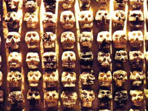 Rows of skull masks in the Templo Mayor, an Aztec archaeological site in the center of Mexico City © Anthony Wright, 2013