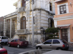 Two beautiful old homes in Viejo Mazatlan, the historical district of this port on the Mexican Pacfic. One has been lovingly restored; the other awaits its rebirth. © Carolyn Patten, 2009