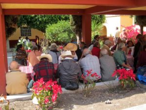 Group prayer and singing precede the midweek meal offered by S.O.M.E (So Others May Eat) in San Miguel de Allende. © Edythe Anstey Hanen, 2013