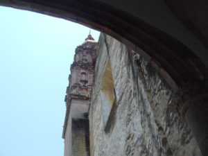 The church’s spire ominously reaches toward heaven. Cuernavaca's Cathedral stands on the site of a Franciscan convent founded in 1525. © Anthony Wright, 2009