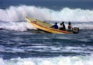 Fishermen Broaching The Surf