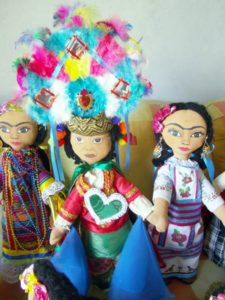 Handcrafted dolls dressed like Mexican artist Frida Kahlo accompany a Diego Rivera doll dresses like the famous Voladores de Papantla, Veracruz © Alvin Starkman, 2012