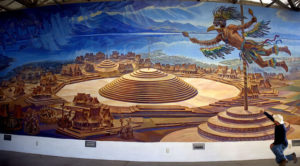 Jorge Monroy working on a section of his 30-meter long mural depicting, among many other things, a Bird Man on a tall pole atop one of the "circular pyramids" at Teuchitlán in Jalisco. © John Pint, 2011