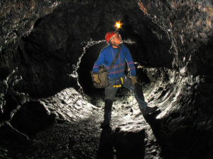 Author John Pint inside six-kilometer-long Iglesia Cave, the best-preserved lava tube in Sistema Tlacotenco, a maze of passages over 20 kilometers in length, located 40 kilometers south of Mexico City. © Chris Lloyd, 2010