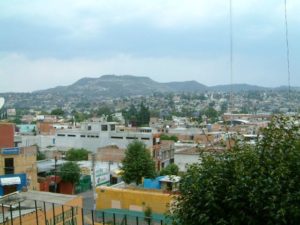 The archeological site of 'San Francisco Ocotelulco' is on top of the hill but not quite visible. The whole wall of my room facing the city and even the bathroom wall was glass.