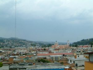 A panorama from my room at Albergue de la Loma generally looking northeast. Parroquia de San Jose is the large church in the left picture.