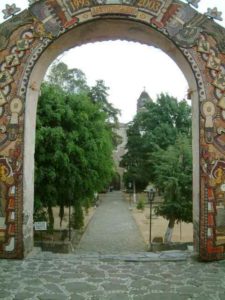 I was intrigued with this pictorial narrative mosaic gate made of colorful seeds like corn kernels and sunflower seeds.