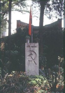The flag of the former Soviet Union hangs limply over Trotsky's tomb in the lush inner courtyard of his house in Coyoacán.