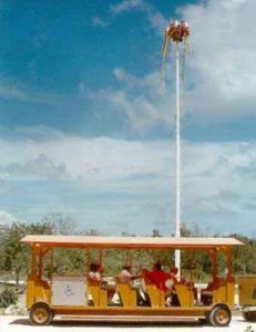 Tourists in a tram at Tulum, a Maya archeological site in Quintana Roo. © Anthony Wright, 2001