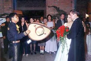 A mariachi group often plays as the newlyweds leave the church, then escorts them to promenade at the plaza.