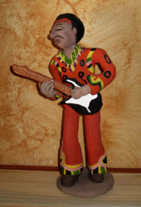 Just for fun, Manuel Reyes depicts Jimi Hendrix in a hand-painted ceramic sculpture. The Mexican artist is often inspired by classic rock music and rock stars. © Alvin Starkman 2008