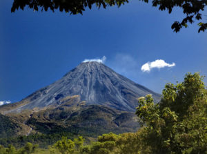 Colima's Volcán de Fuego or Fire Volcano rises 3820 meters (12,533 feet) high and threatens the area with mighty rumbles and frequent lava flows. © John Pint, 2010