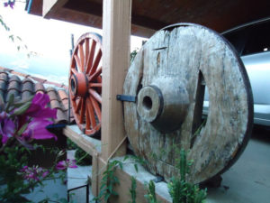 Antique Mexican wagon wheels from two eras © Alvin Starkman, 2011