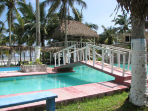 A cool swimming pool invites guests to take a dip. Quinta Alicia Trailer Park on the Emerald Coast of Veracruz offers rustic comfort right on the Gulf of Mexico. © William B. Kaliher, 2010