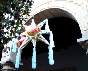 A Mexican Christmas piñata shaped like a star has seven points, representing the seven deadly sins. © Daniel Wheeler 2009
