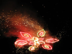 A colored flower shoots sparkles from the top of a castillo in Santa Maria town in Mexico. © Julia Taylor, 2007