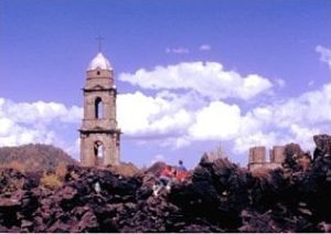 Parts of the church of viejo San Juan P. still rise above the lava.