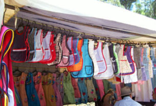Colorful aprons on display in the market of Ocotlan, Oaxaca Karen Hursh Graber, 2011