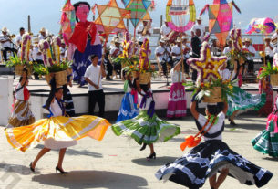 Chinas or "Chinese Girls" from Oaxaca's central valleys whirl to the music of a local folkloric orchestra.This is part of Oaxaca's annual Guelaguetza festivities held the last two Mondays of July.   © Oscar Encines, 2008