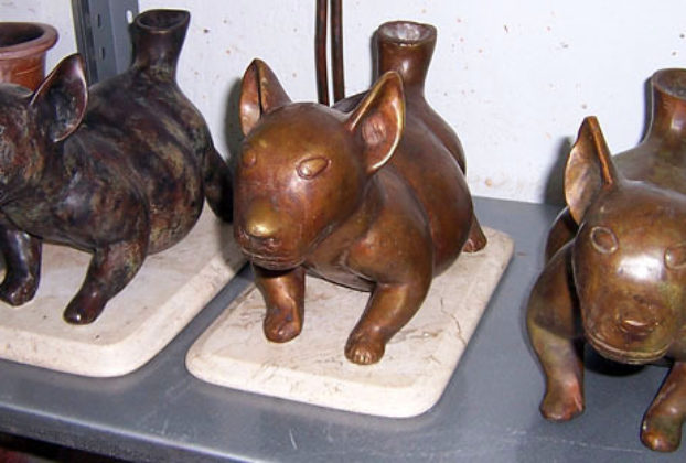 Bronze dog effigies