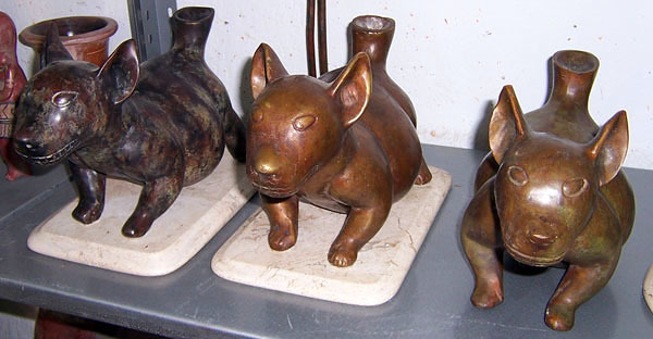 Bronze dog effigies