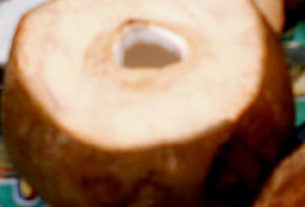 Coconut ready to drain the milk © Sergio Wheeler, 2011