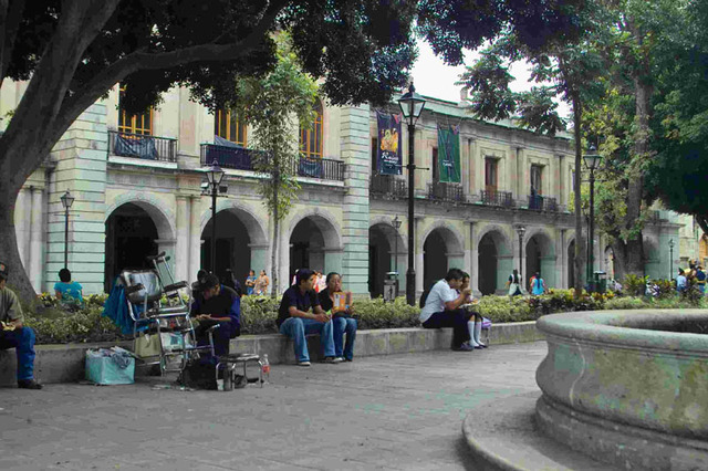 Oaxaca's zócalo, with facade of presidential palace in background, is a pleasant place to spend the afternoon. © Dan Ellsworth, 2009
